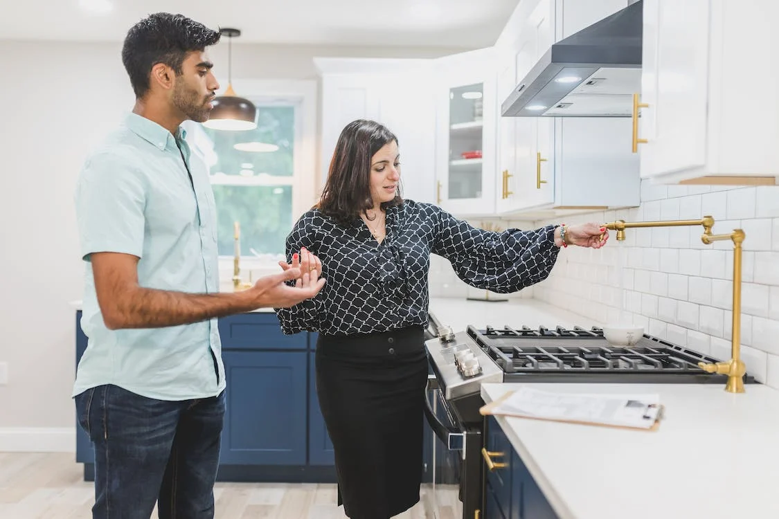 a homebuyer viewing homes for sale in Hayward CA with his agent